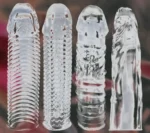 Pack of 4 crystal textured penis sleeves in different shapes and textures for length and girth enhancement